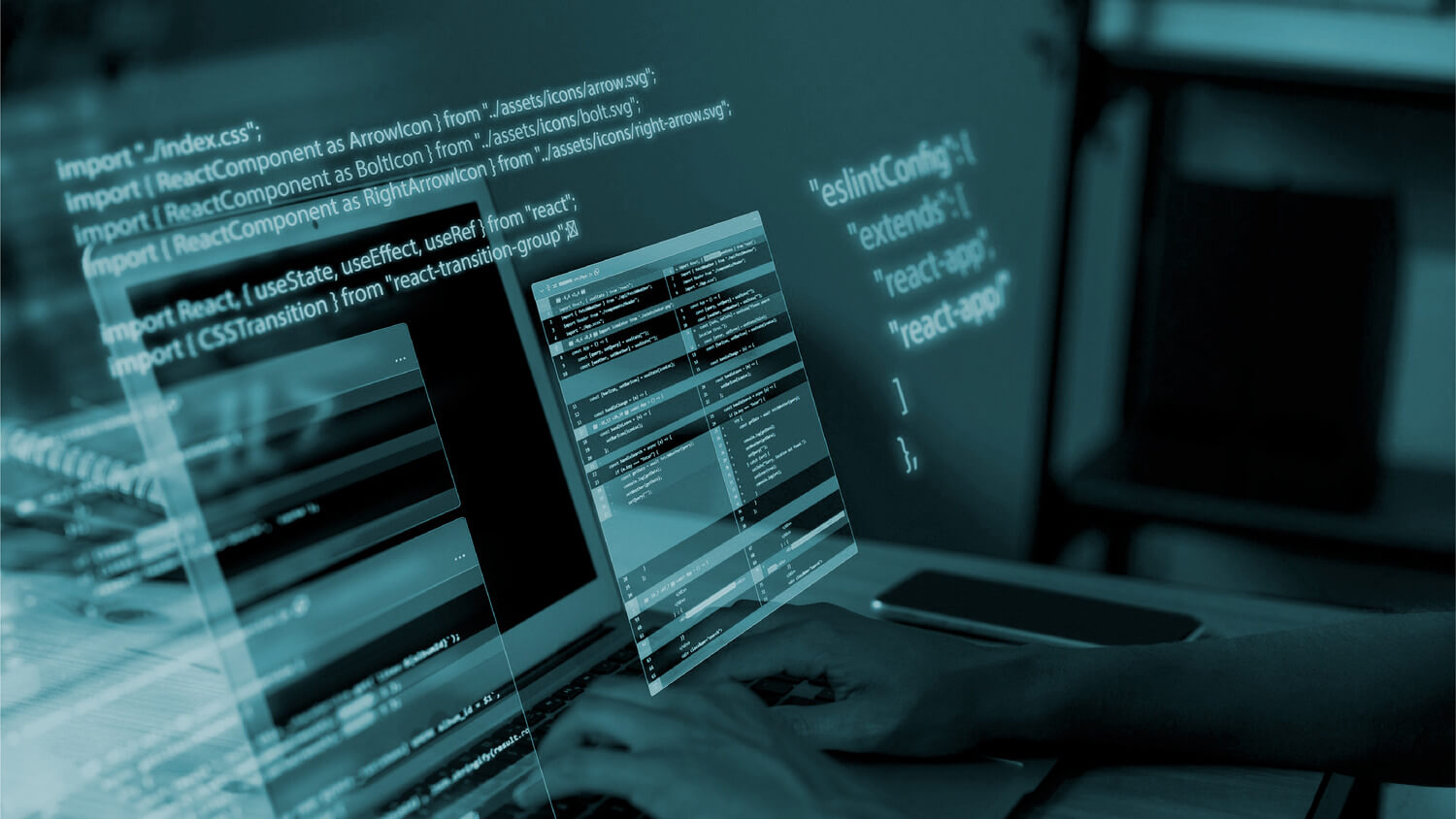 Hands typing on a laptop with transparent overlays of JavaScript and React code, symbolizing agile software development processes.